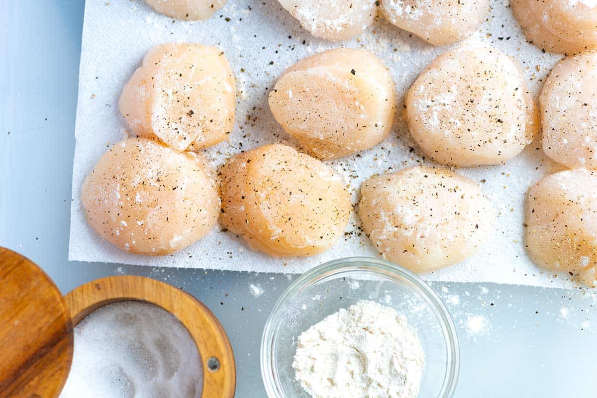 Scallops with a light dusting of flour, salt and pepper