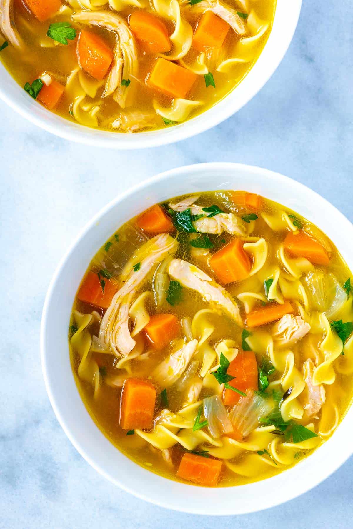 Bowls of homemade chicken noodle soup