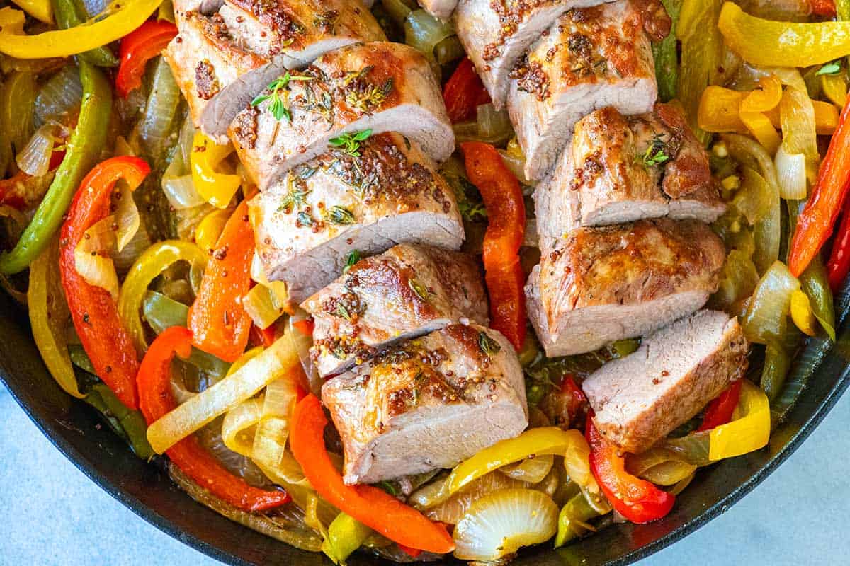 Juicy Pork Tenderloin Recipe with Peppers and Onions