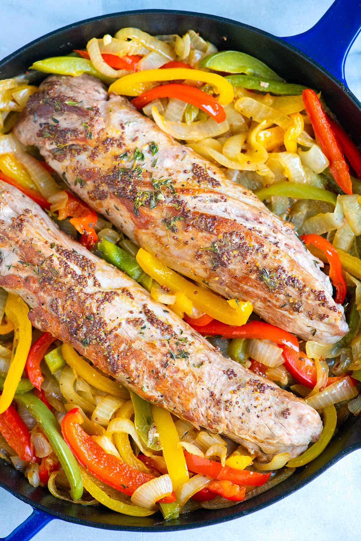 How to Make Juicy Pork Tenderloin with Peppers and Onions
