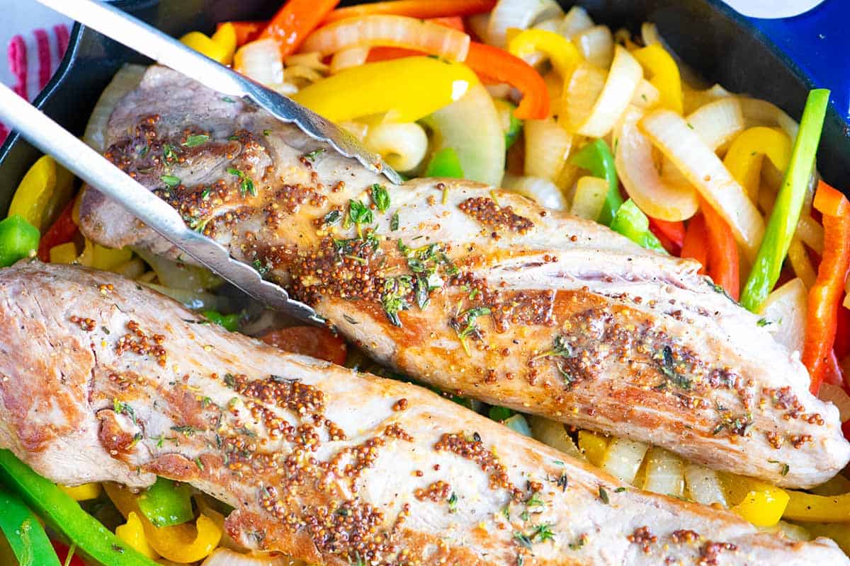 How to Make Juicy Pork Tenderloin with Peppers and Onions