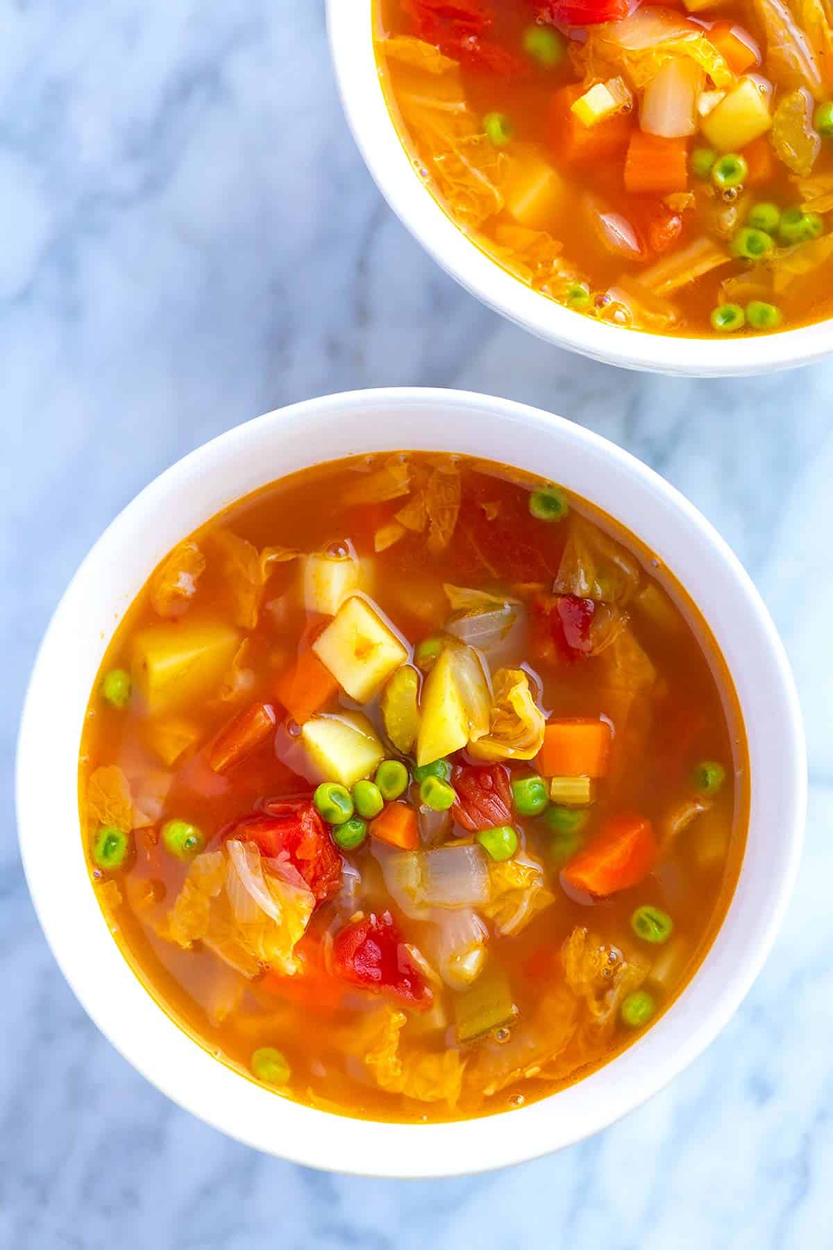 Vegetable Soup with potatoes, cabbage, carrots, and peas