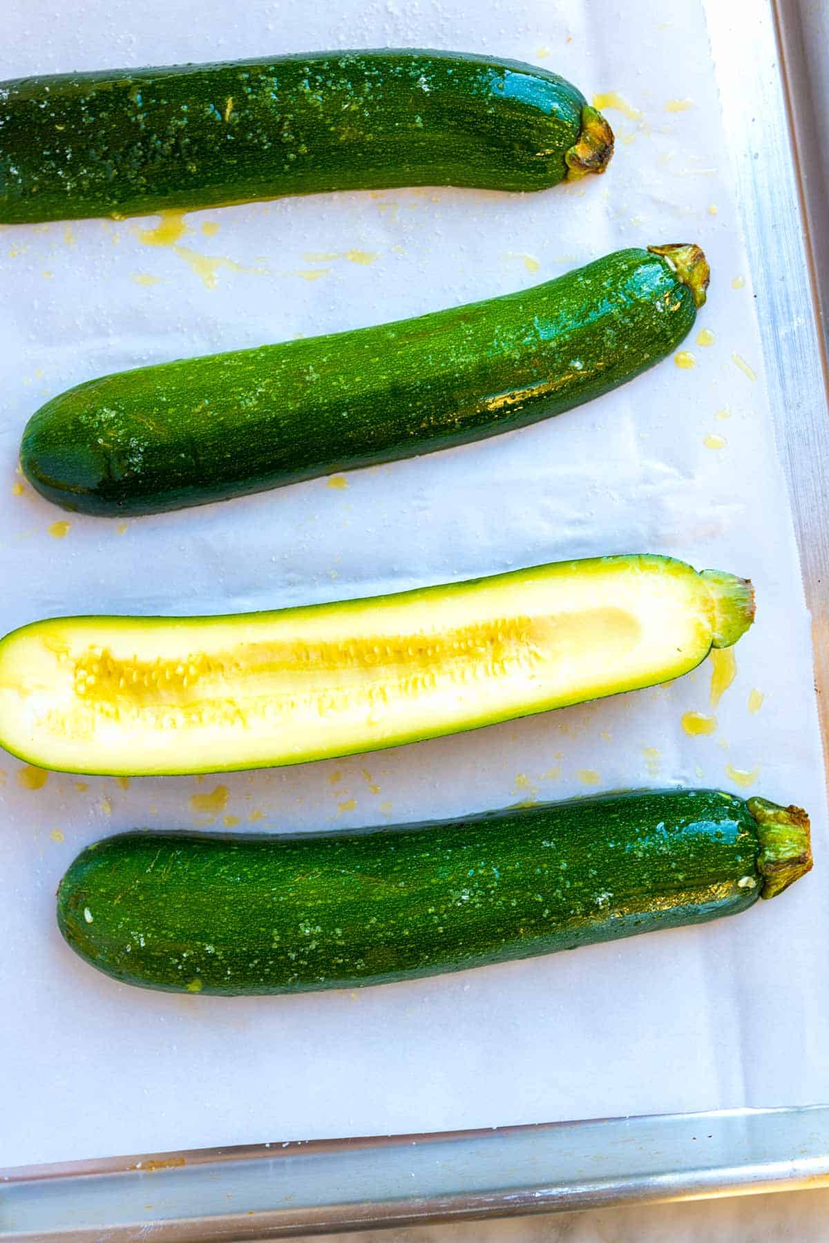 How Do You Make Zucchini Boats Turning zucchini into zucchini boats ready for stuffing
