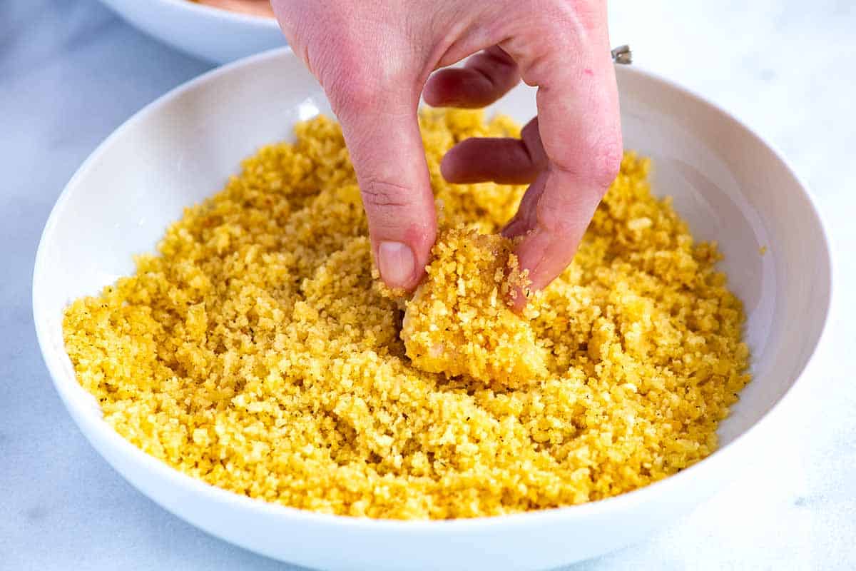 Breading chicken in crushed potato chips