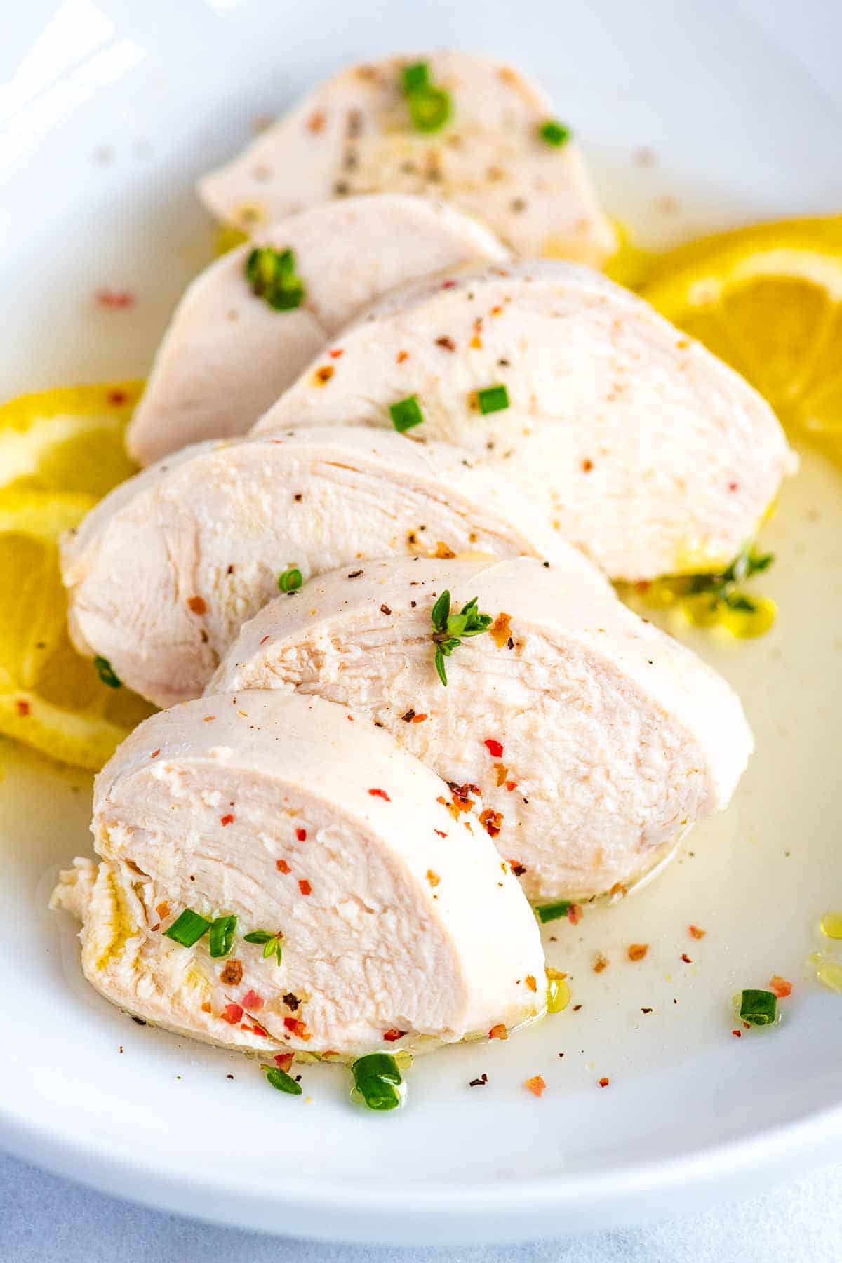 Juicy poached chicken breasts