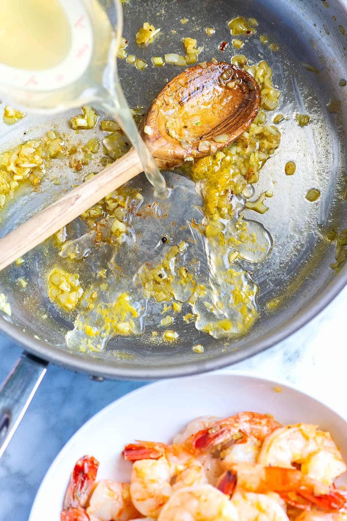 Making shrimp scampi sauce