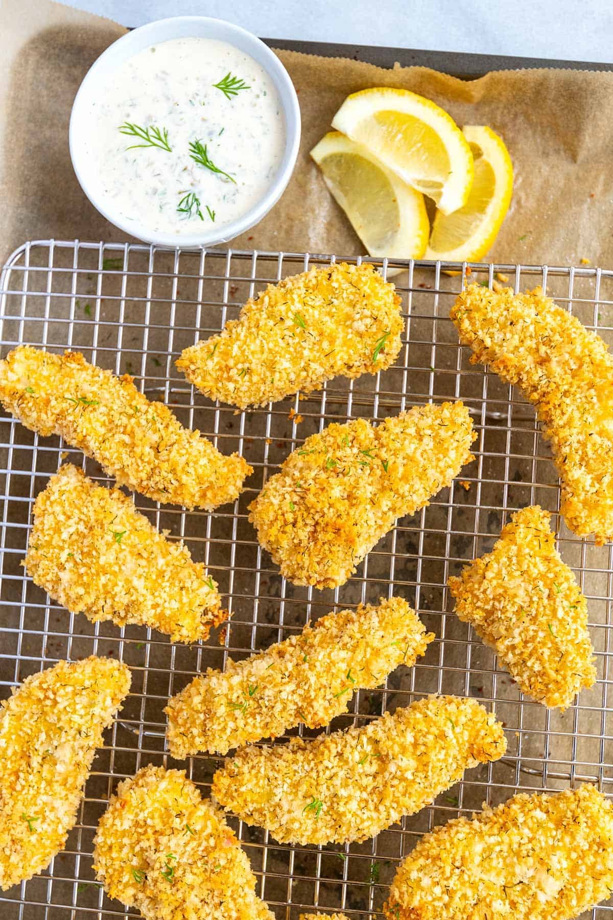 Homemade Fish Sticks with tartar sauce on the side