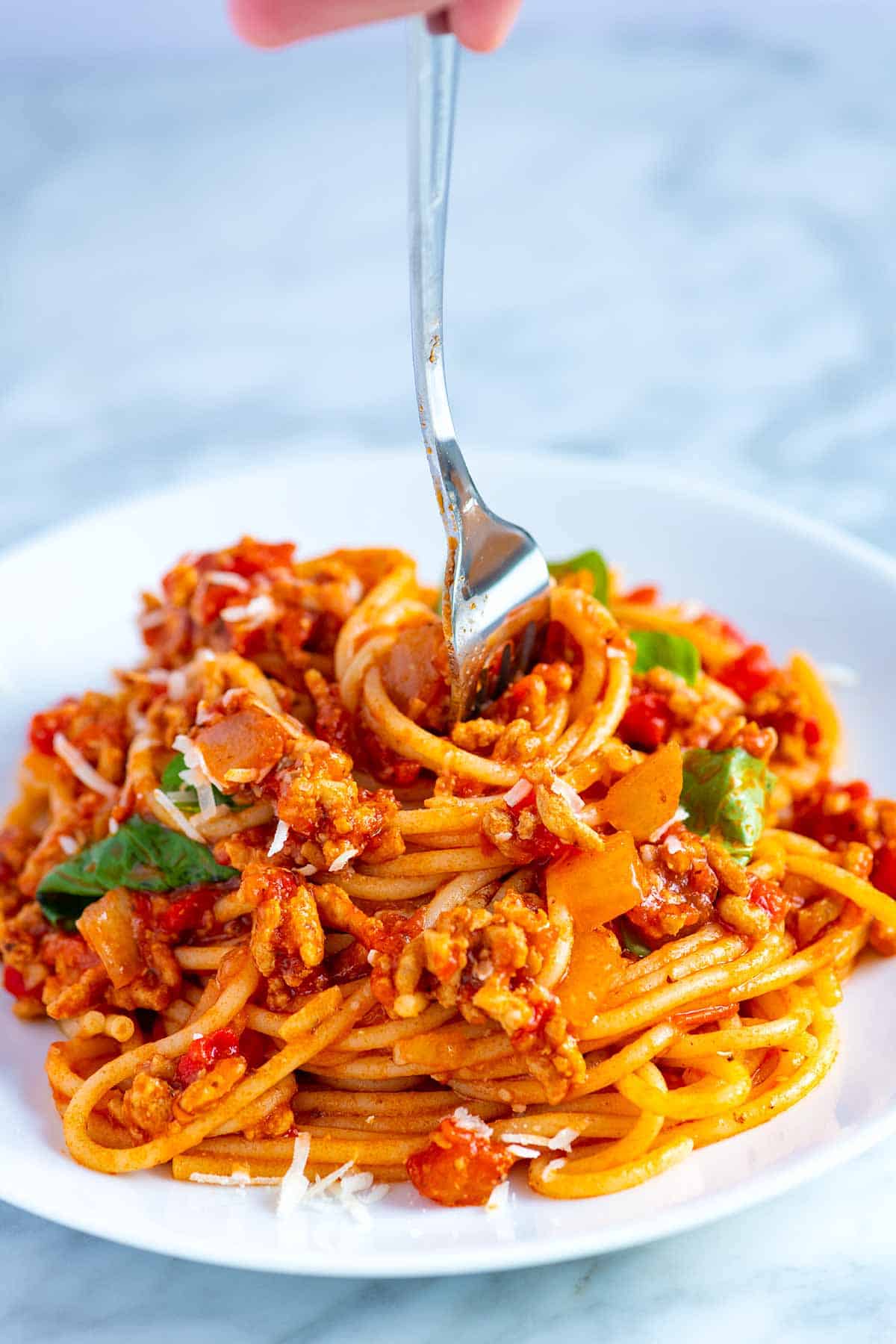 Twirling Spaghetti with Meat Sauce onto a fork