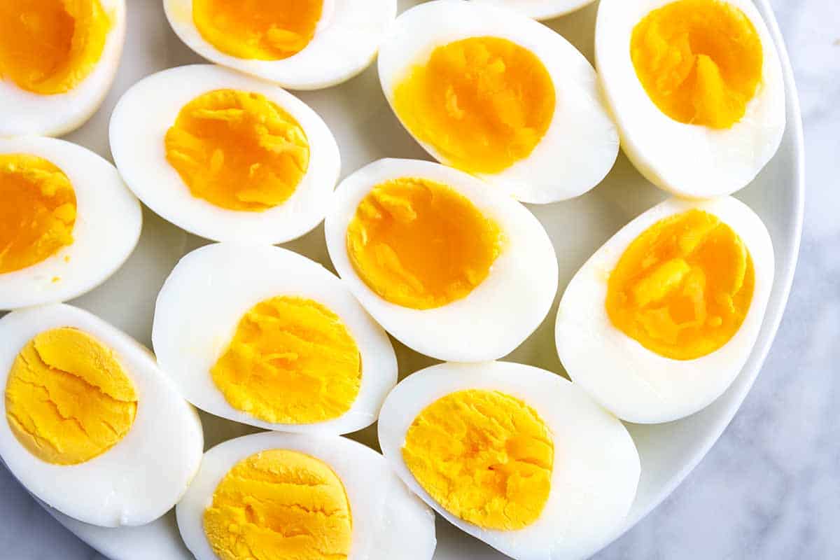 Perfectly cooked Instant Pot hard-boiled eggs sliced in half, showing creamy yolks