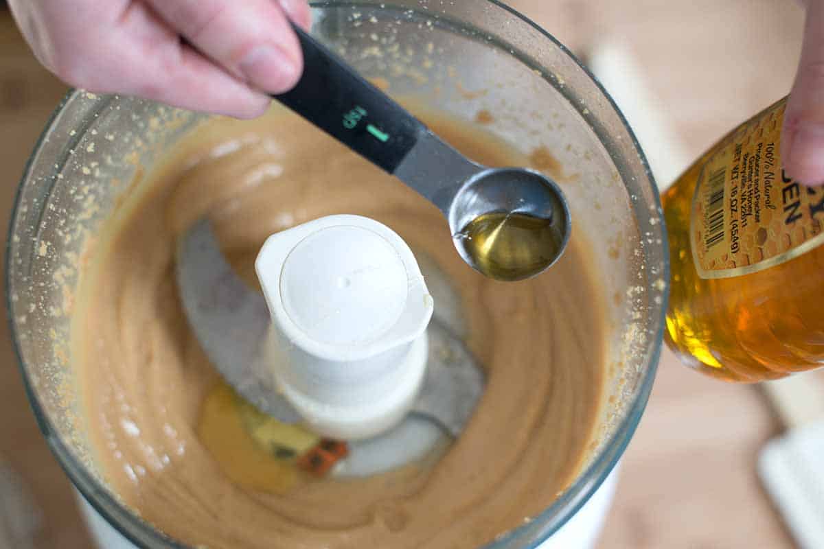 Then, after a bit more processing the whole mixture just sort of gives up and turns into a silky smooth peanut butter.