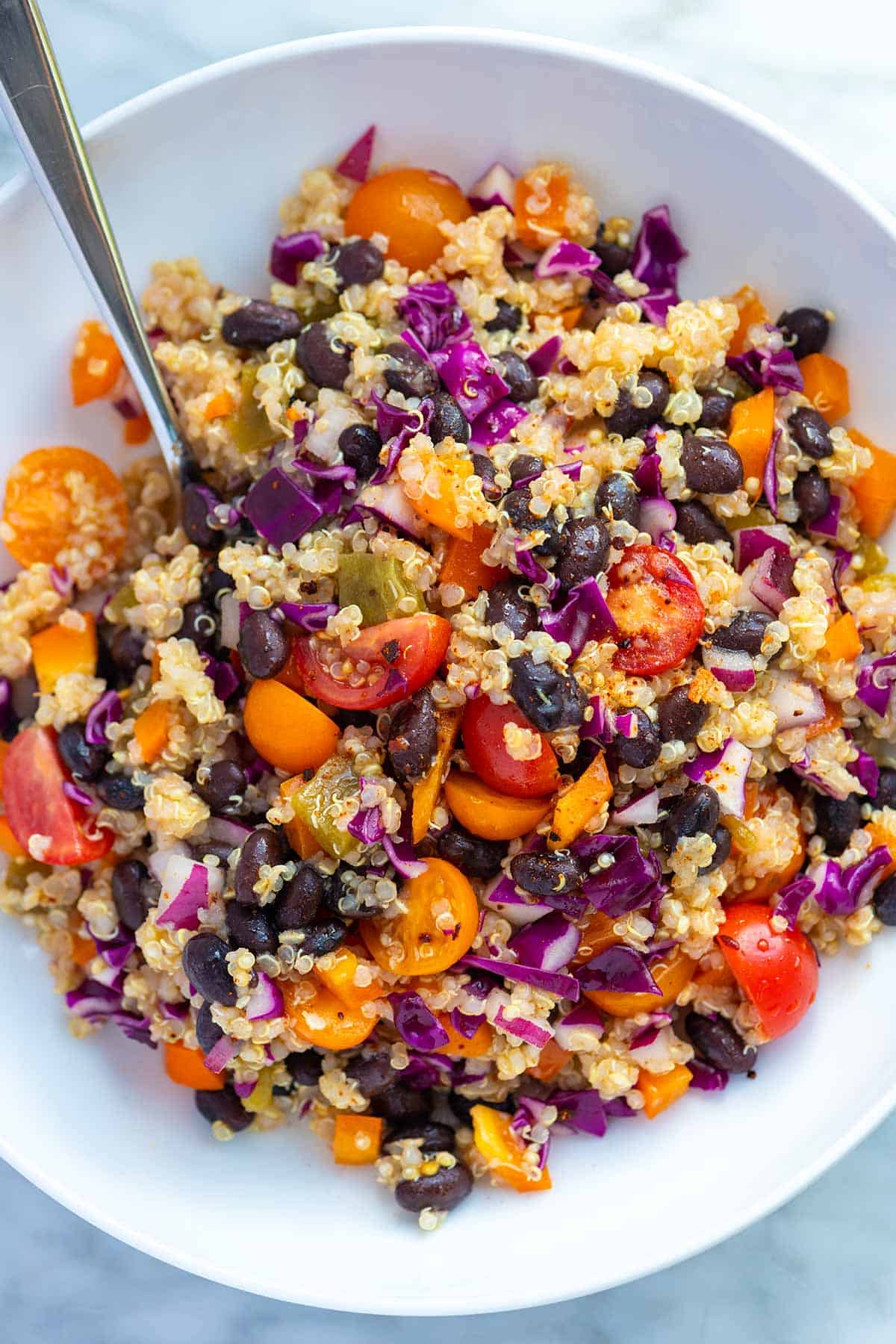Black Bean and Quinoa Salad with black beans, quinoa, vegetables, and a zesty dressing