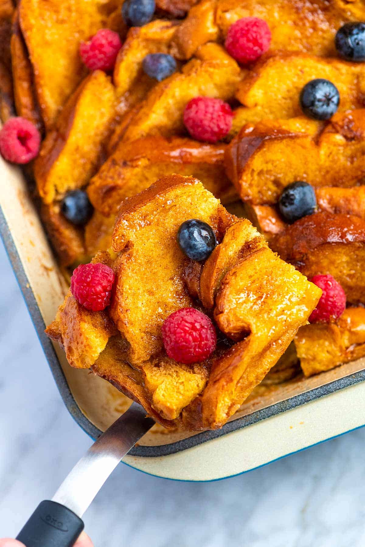 This easy baked French toast casserole is lightly spiced, slightly sweet, perfectly soft in the middle, and has a buttery crisp top. You can make this straight away or make it in advance -- even overnight!
