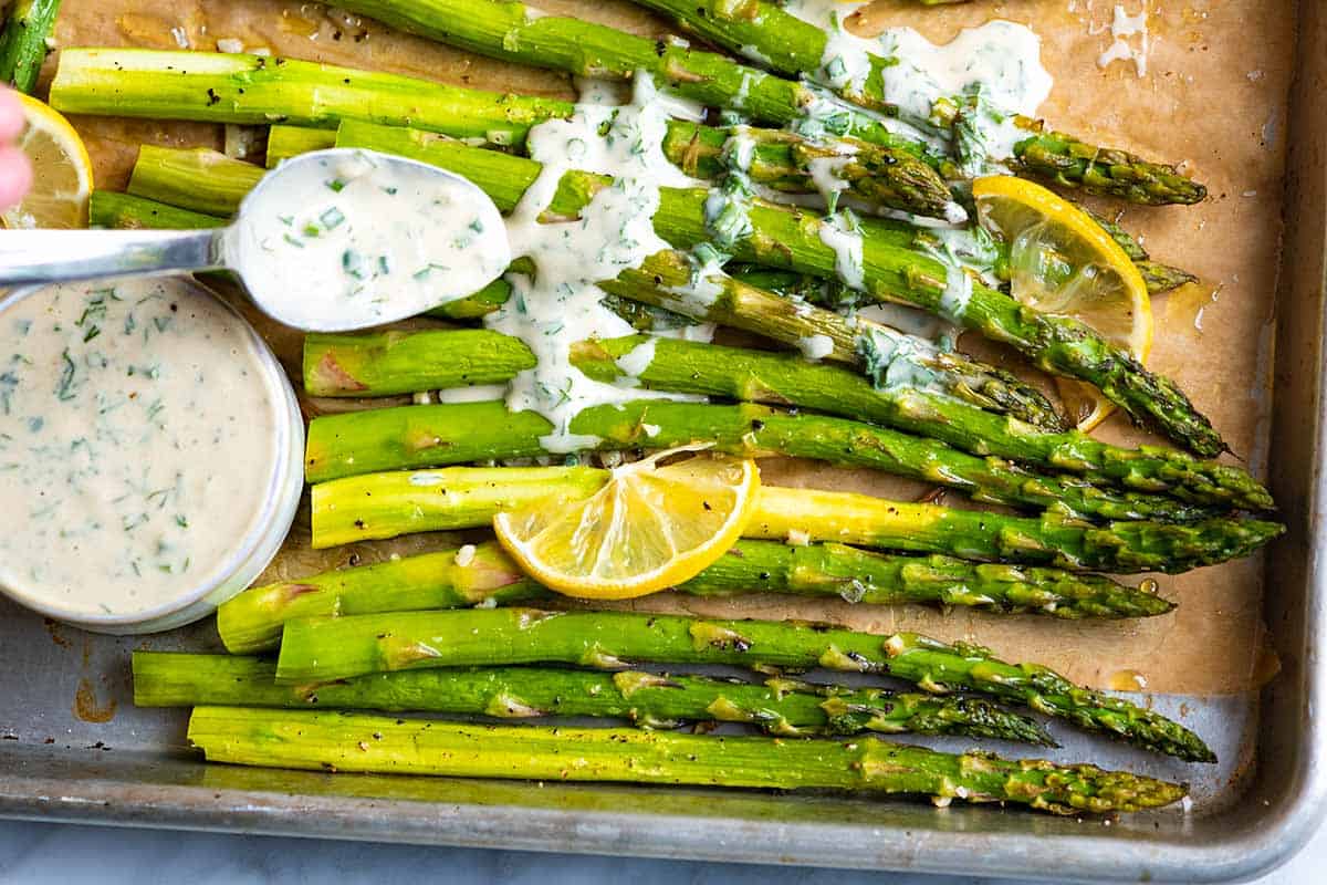 This roasted asparagus recipe is a simple, fast side dish. The asparagus is perfectly tender with slightly crispy tips. 