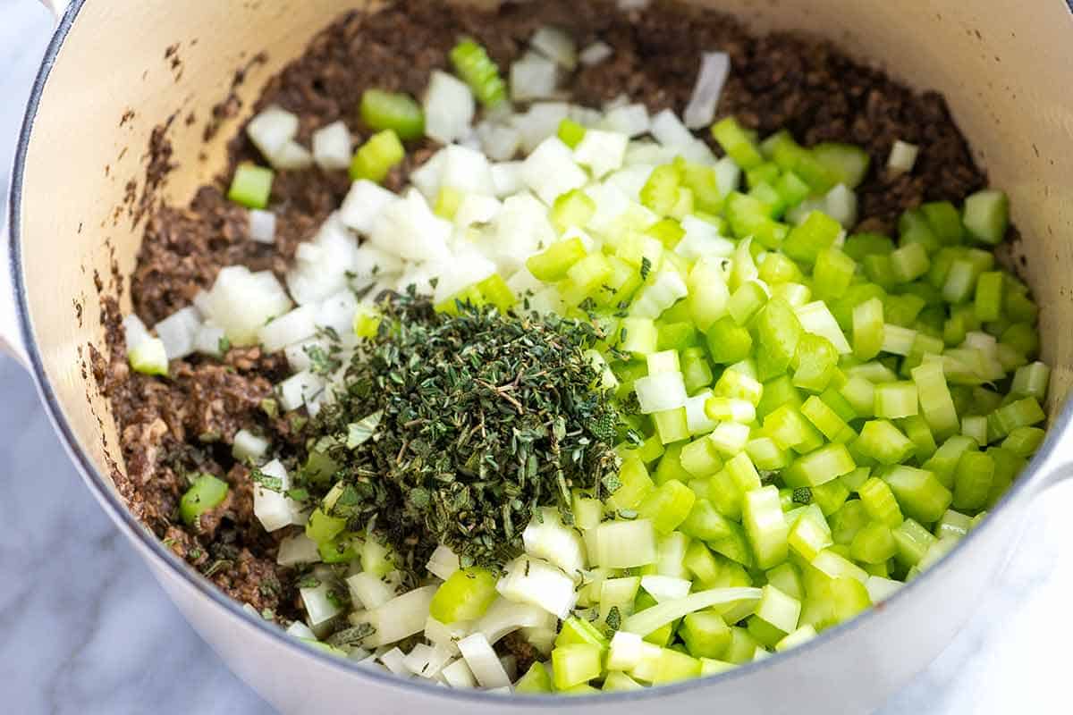 Cooking mushrooms with celery and onions