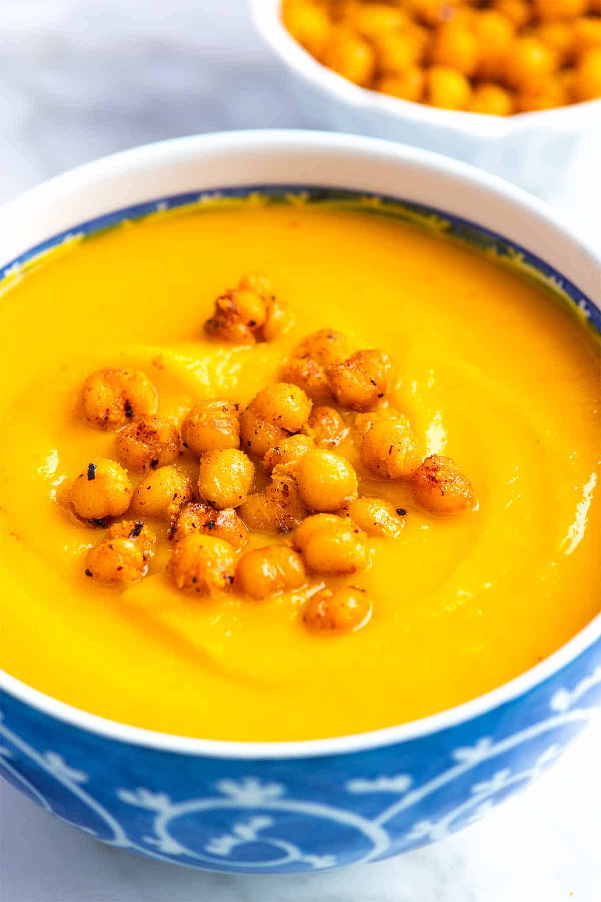 This easy butternut squash soup is unbelievably creamy, satisfying, and so flavorful. It's also very simple to make, delicious when made in advance, and naturally vegan.
