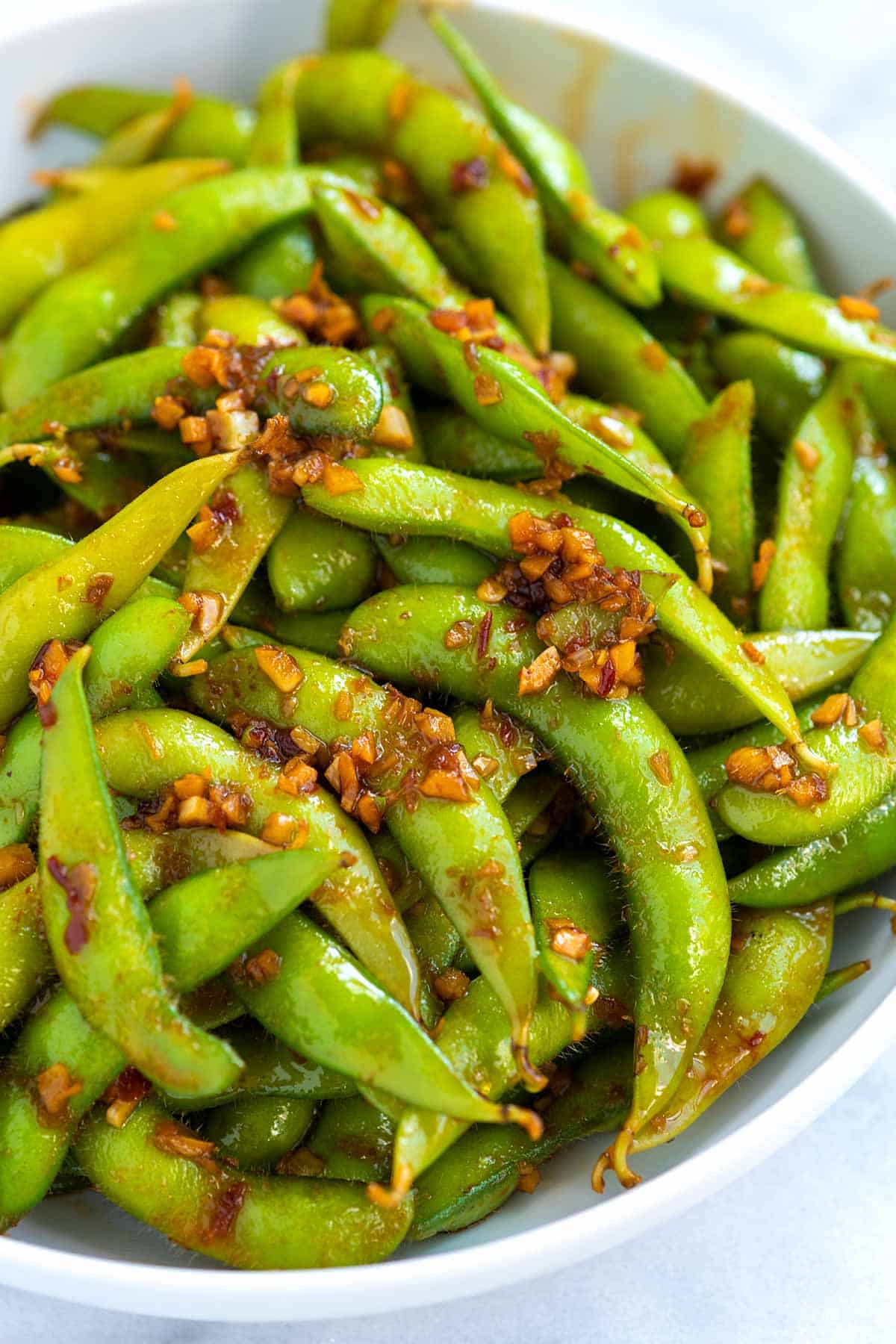 Spicy edamame pods with chili garlic sauce