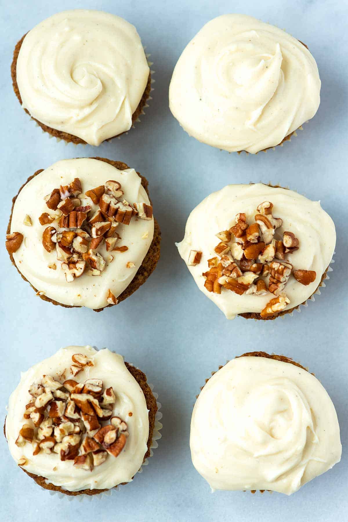 6 carrot cake cupcakes with creamy cream cheese frosting