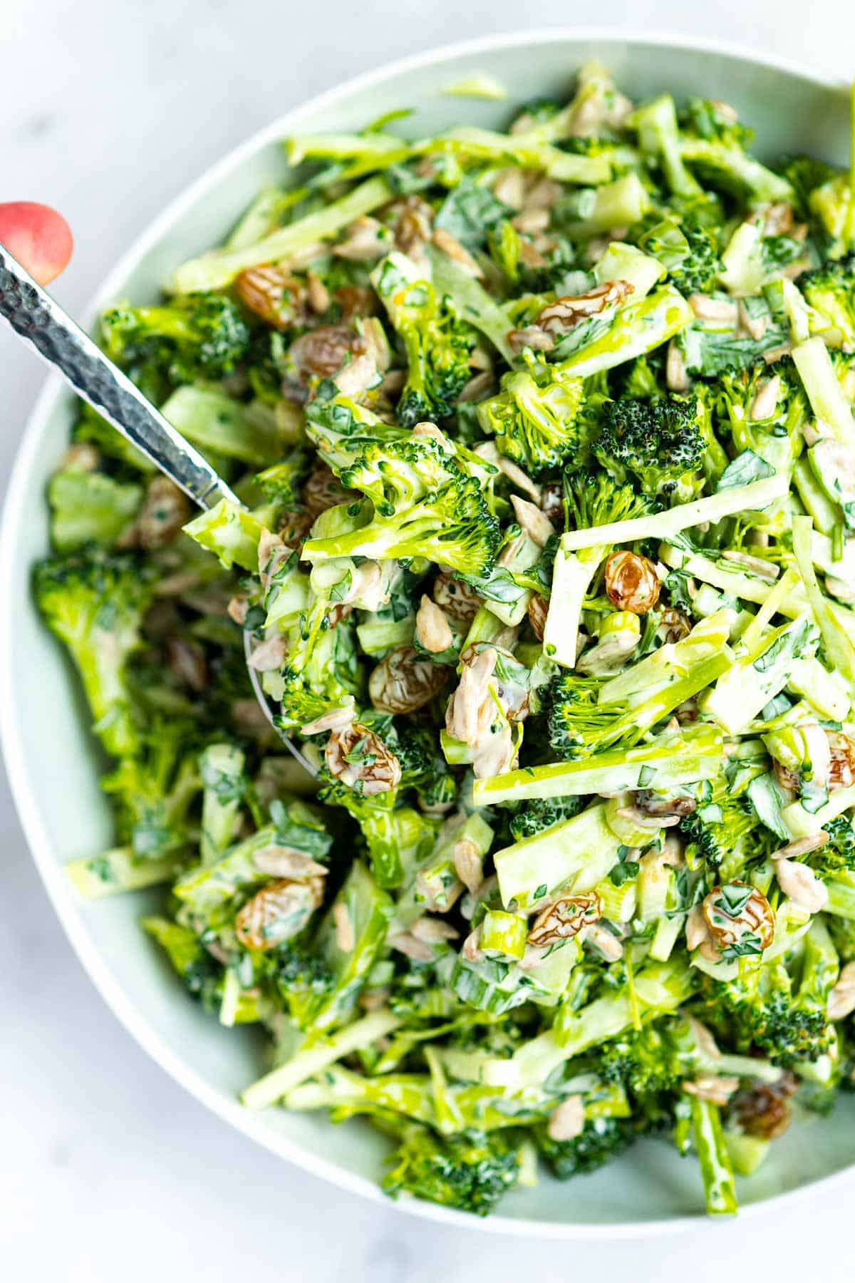 Broccoli Coleslaw with raisins and sunflower seeds