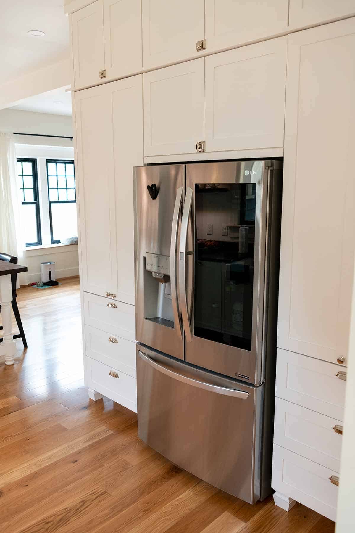 Remodeled kitchen with floor to ceiling cabinets