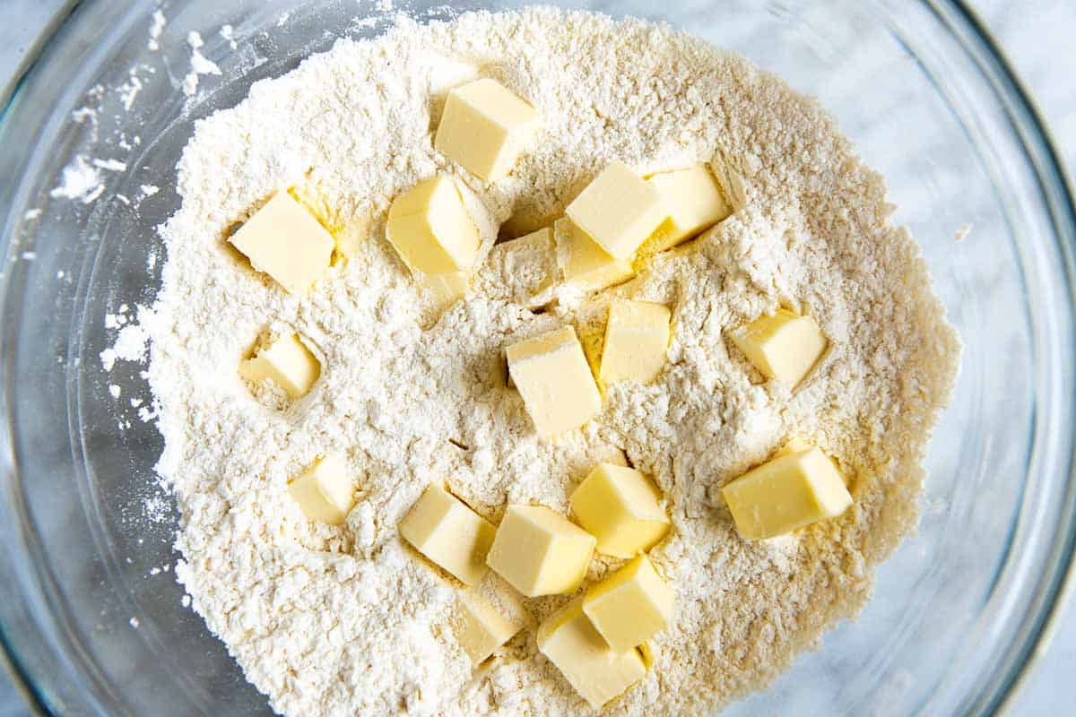 How to make drop biscuits step 1 - adding cold butter to flour