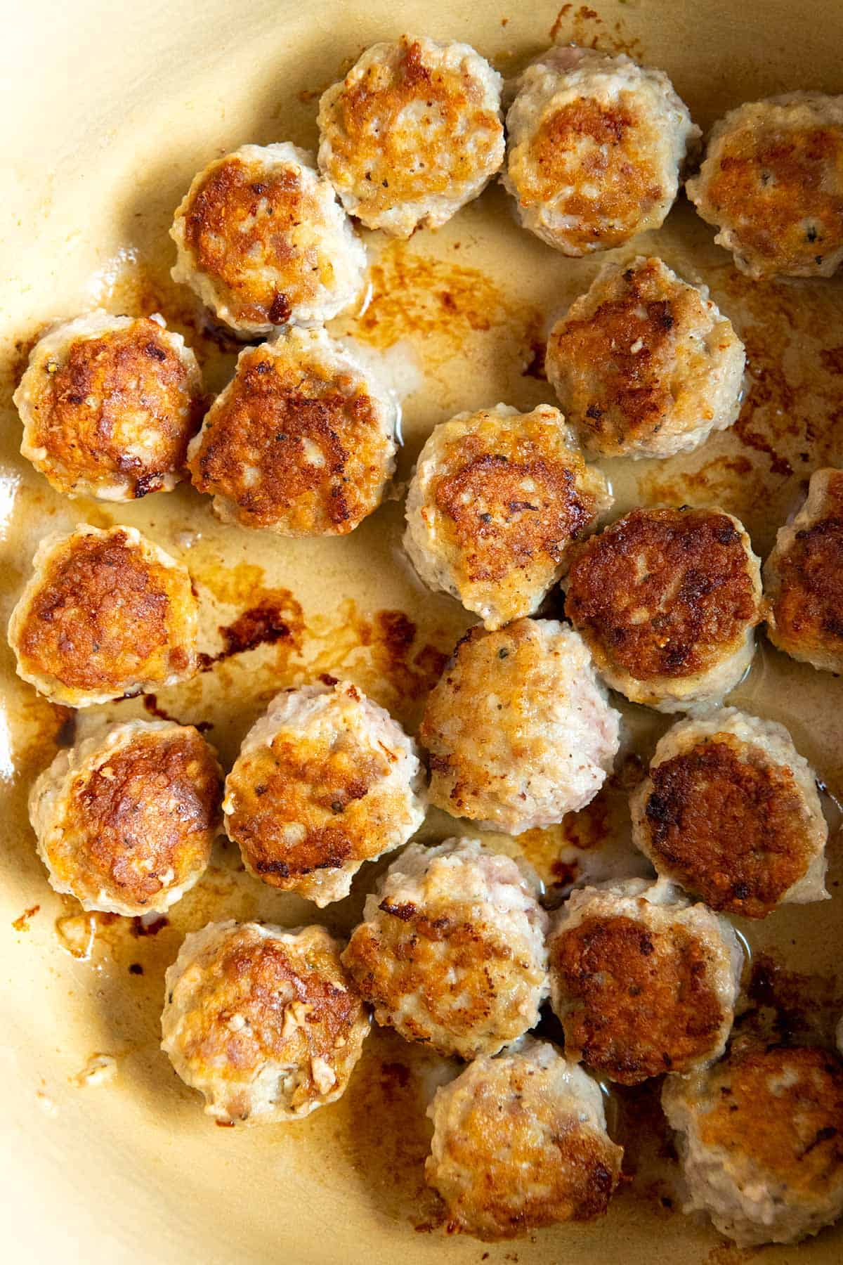 Browning meatballs for Italian wedding soup