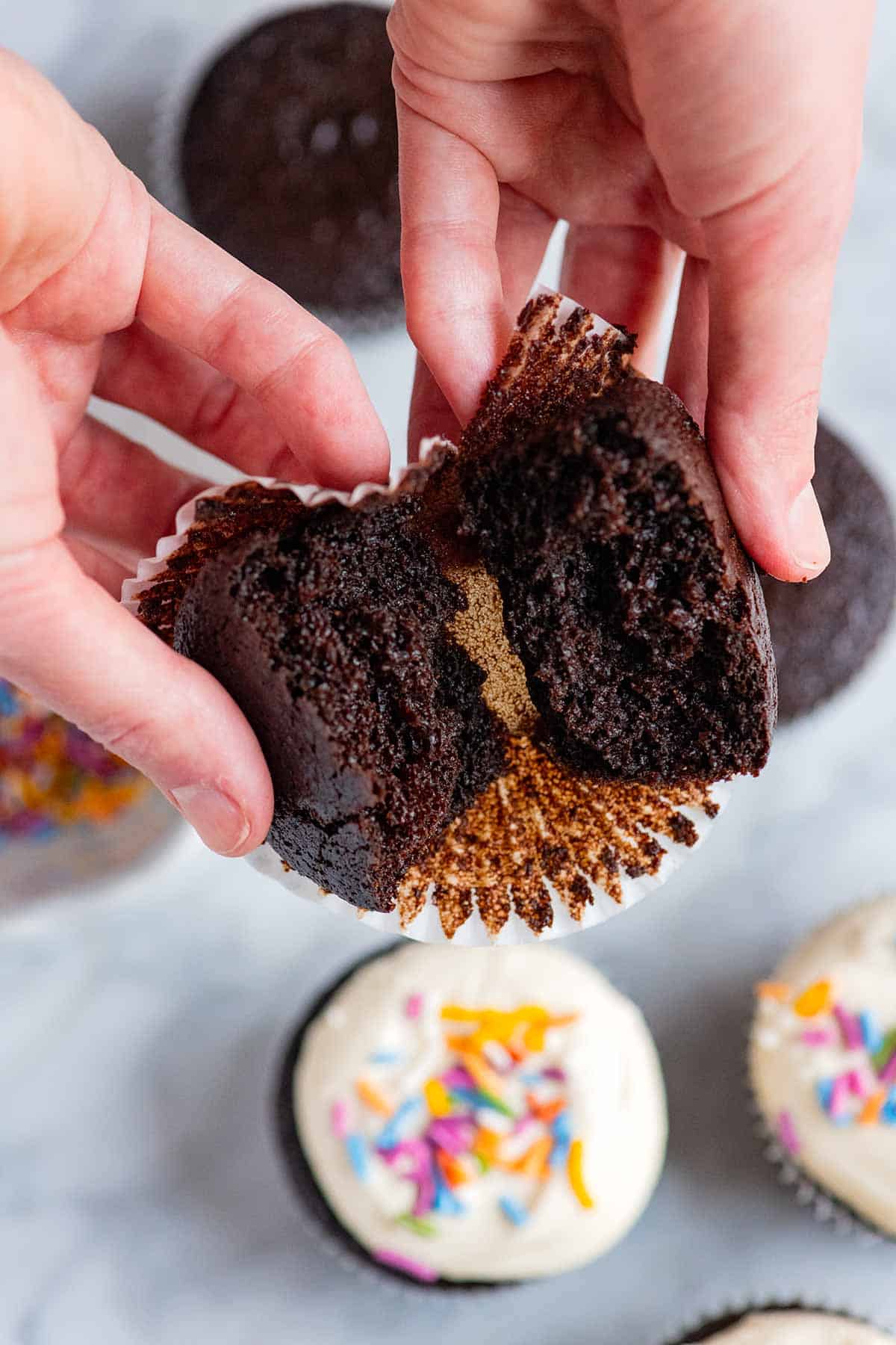 The middle of a baked chocolate cupcake.