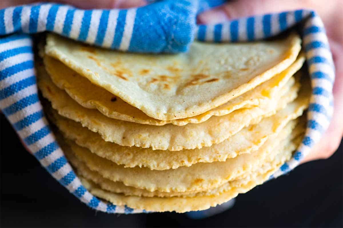 Stack of homemade corn tortillas