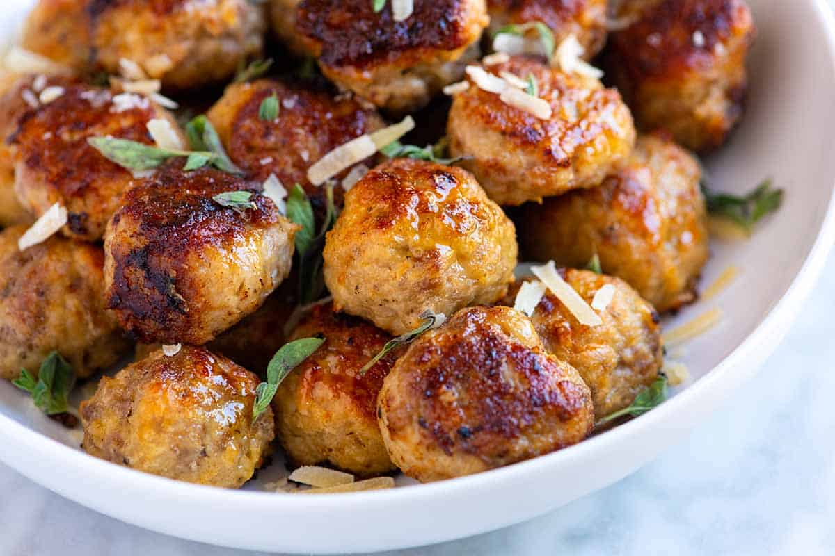 A bowl of cooked tender meatballs