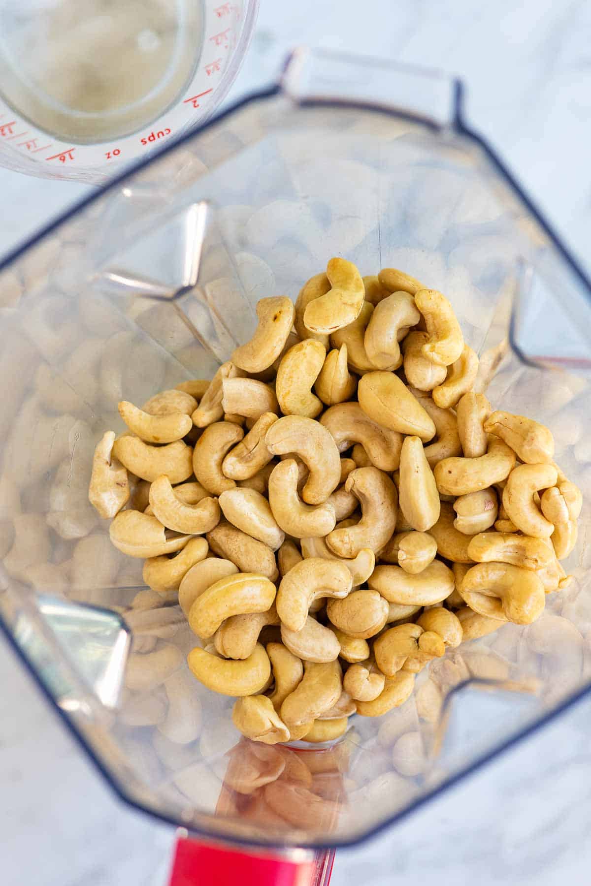 Raw cashews in a blender