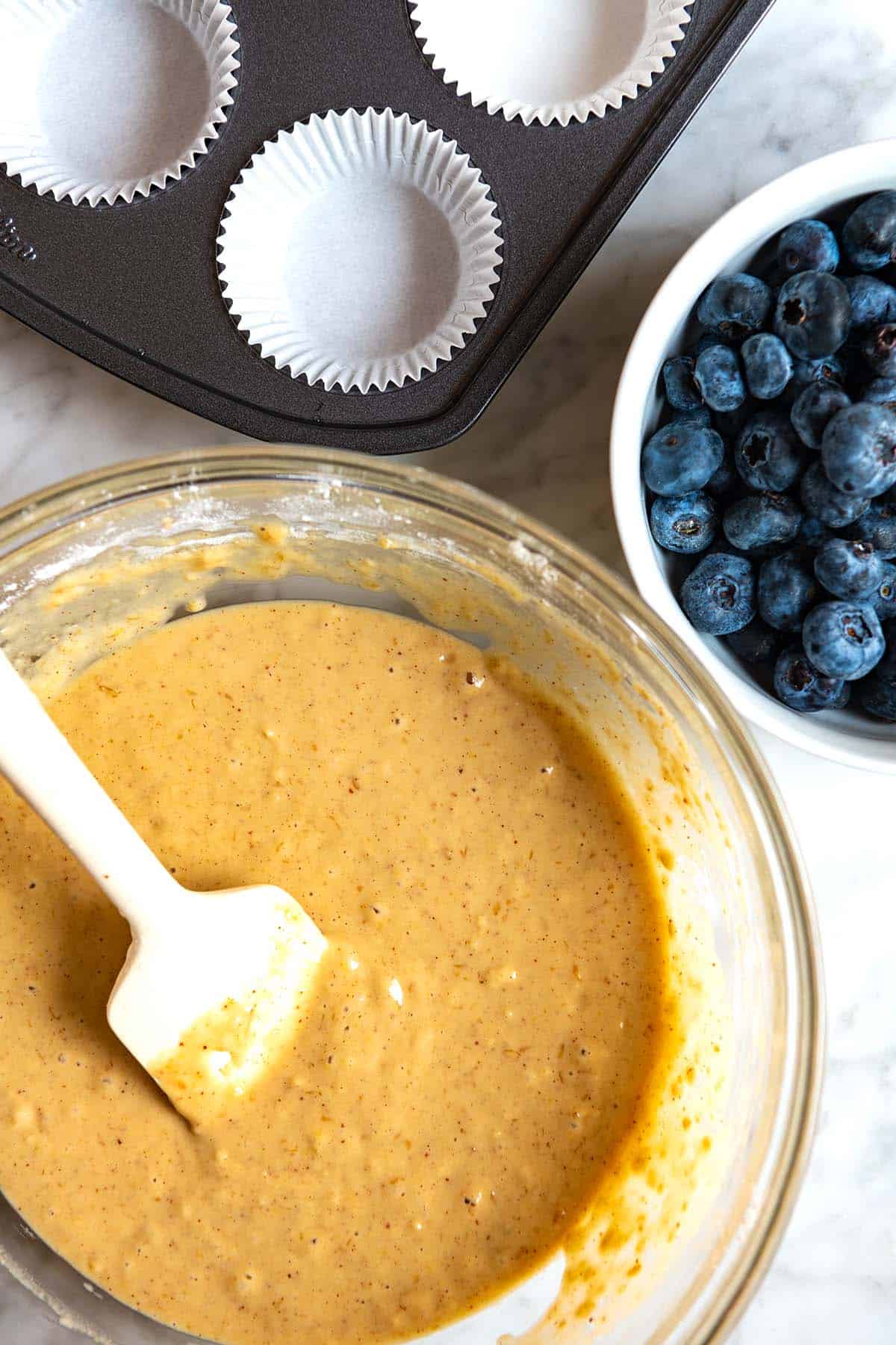 Making vegan blueberry muffin batter