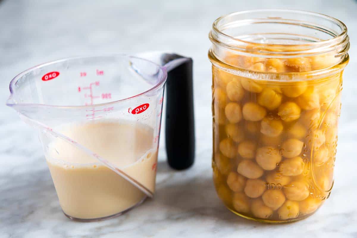 Ingredients for Vegan Mayo. Left: Soy Milk, Right: Chickpeas in Cooking Liquid (aquafaba)