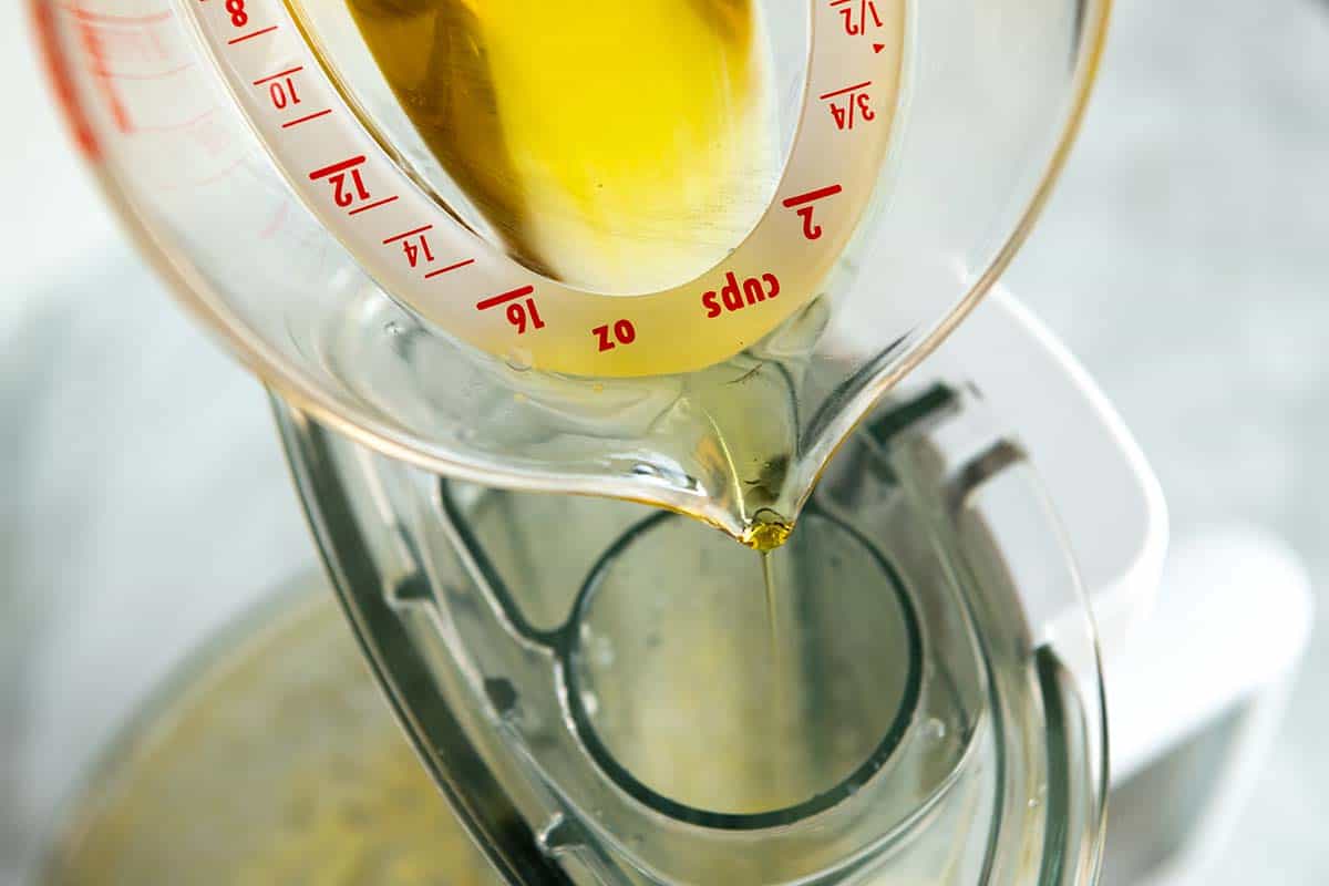 Adding oil to make aioli