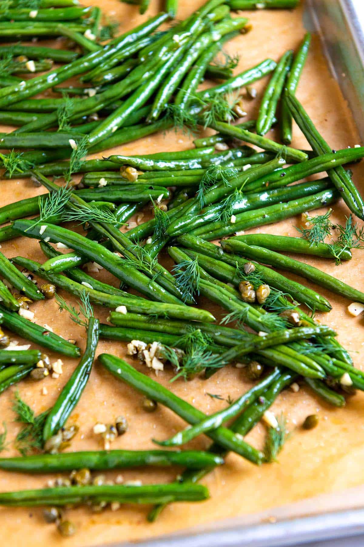 Roasted green beans with garlic, capers, and dill