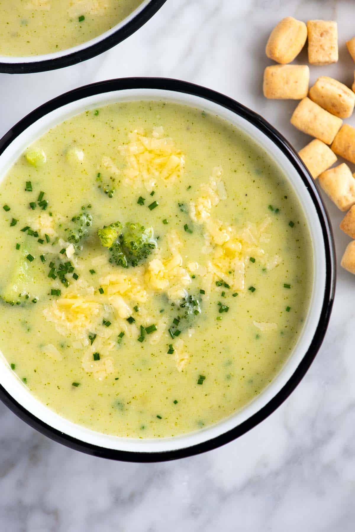 A bowl of broccoli cheddar soup