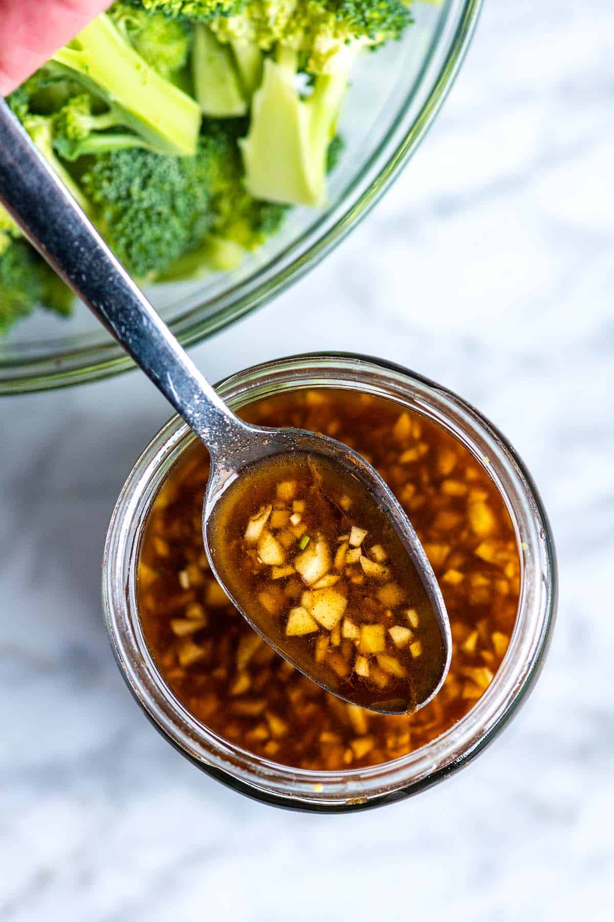 A jar of homemade stir fry sauce made with fresh garlic and ginger.