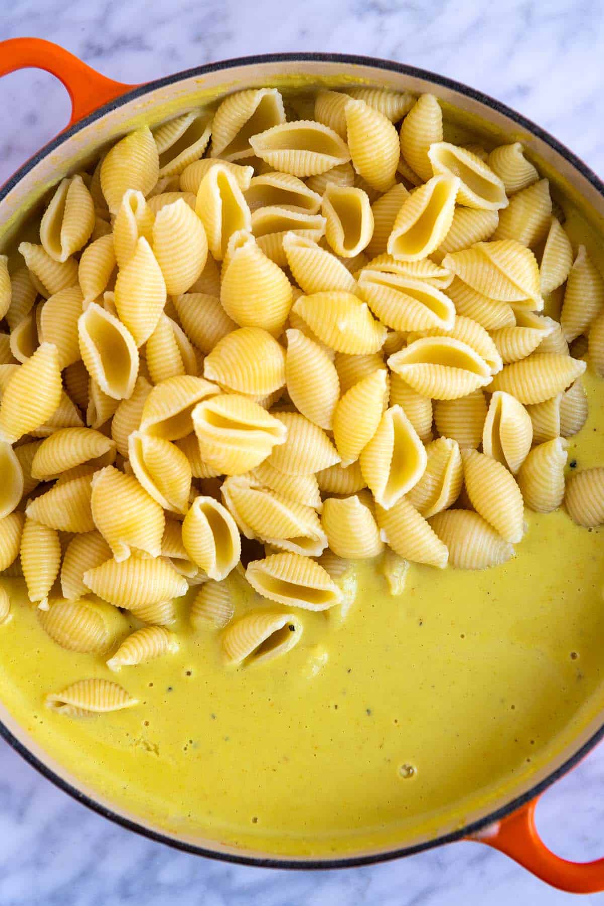 How to Make Vegan Mac and Cheese: Stirring in the pasta