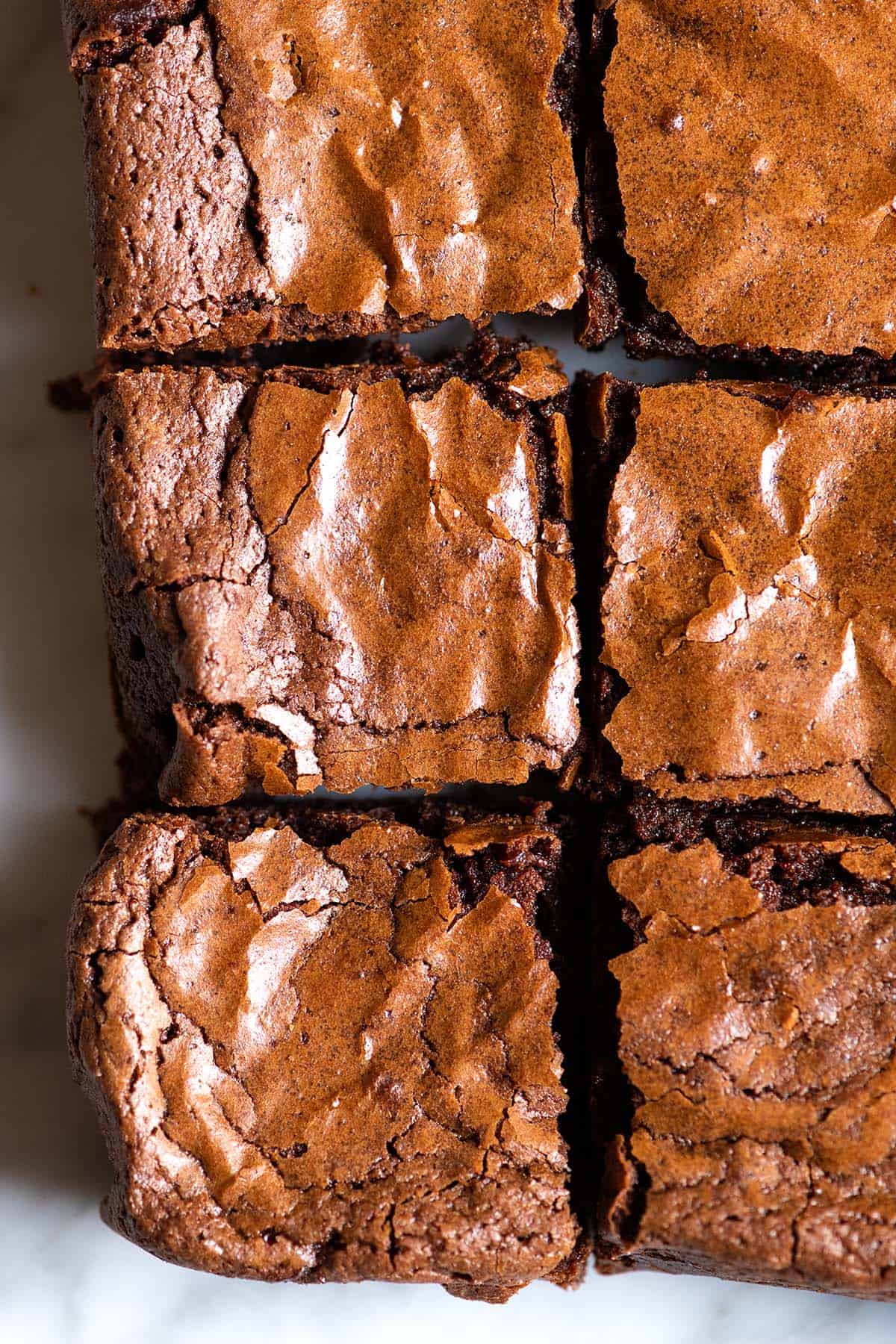 Easy Brownies with chewy edges and fudgy middles.