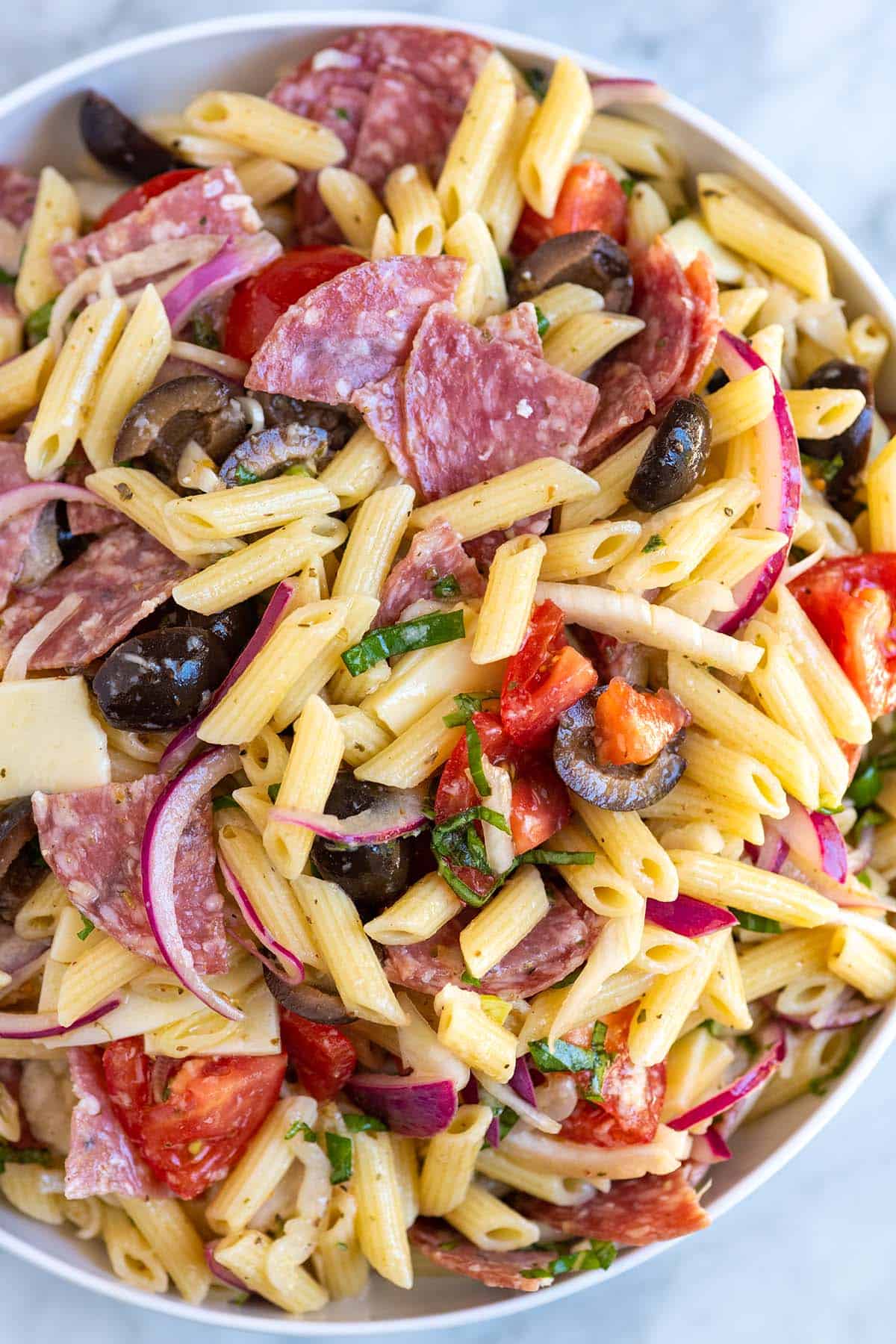 A bowl of Italian pasta salad