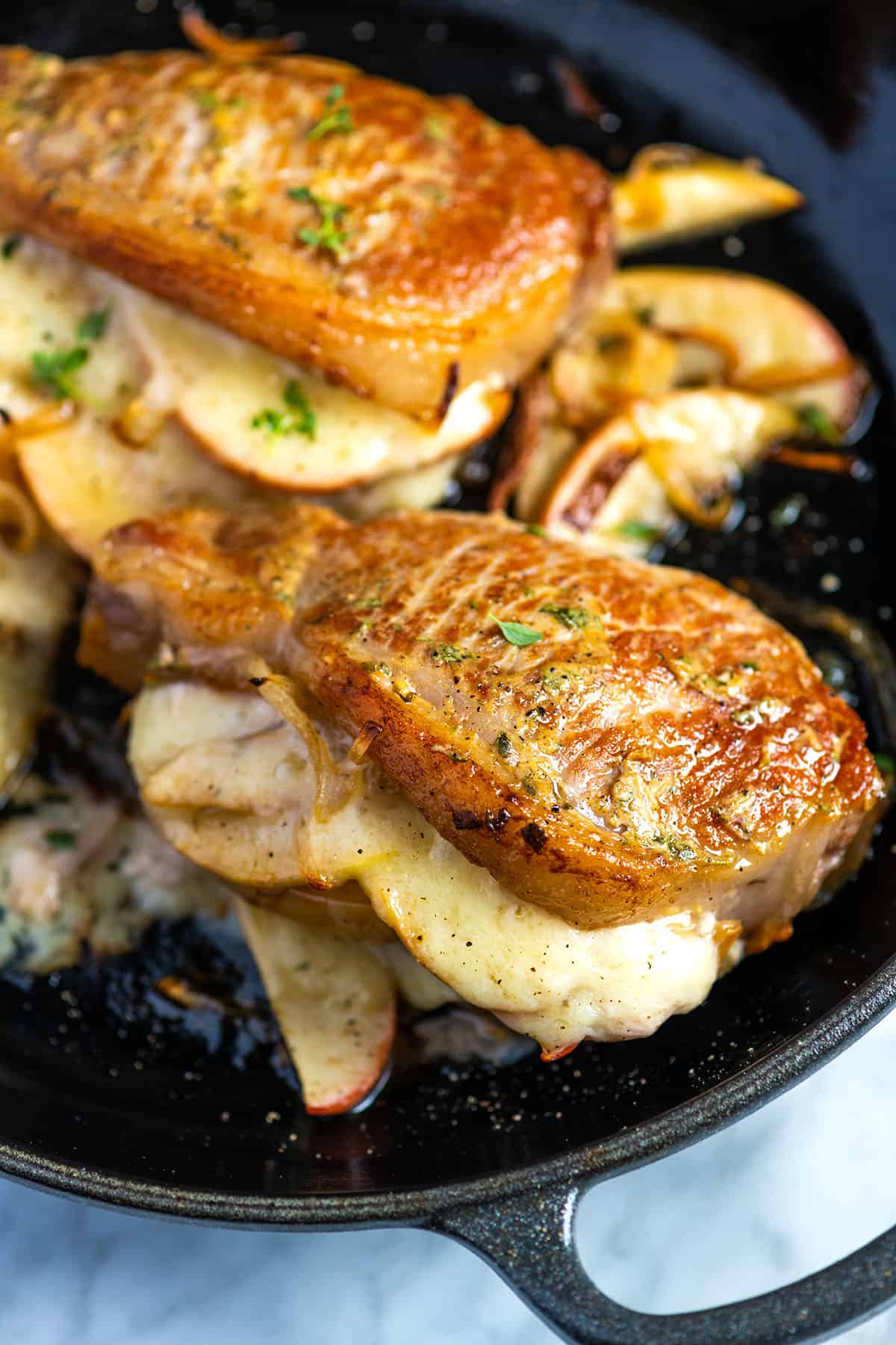 Apple Stuffed Pork Chops with Onions and Cheese