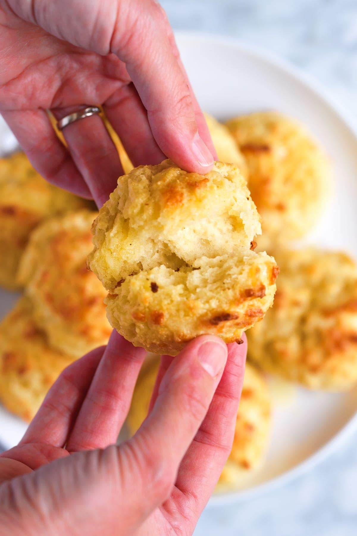 Revealing the inside of an easy cheese drop biscuit