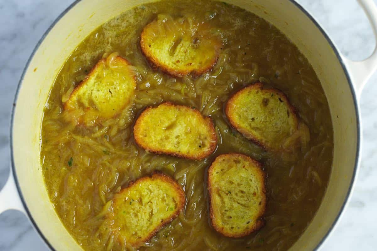 Dipping bread into the soup