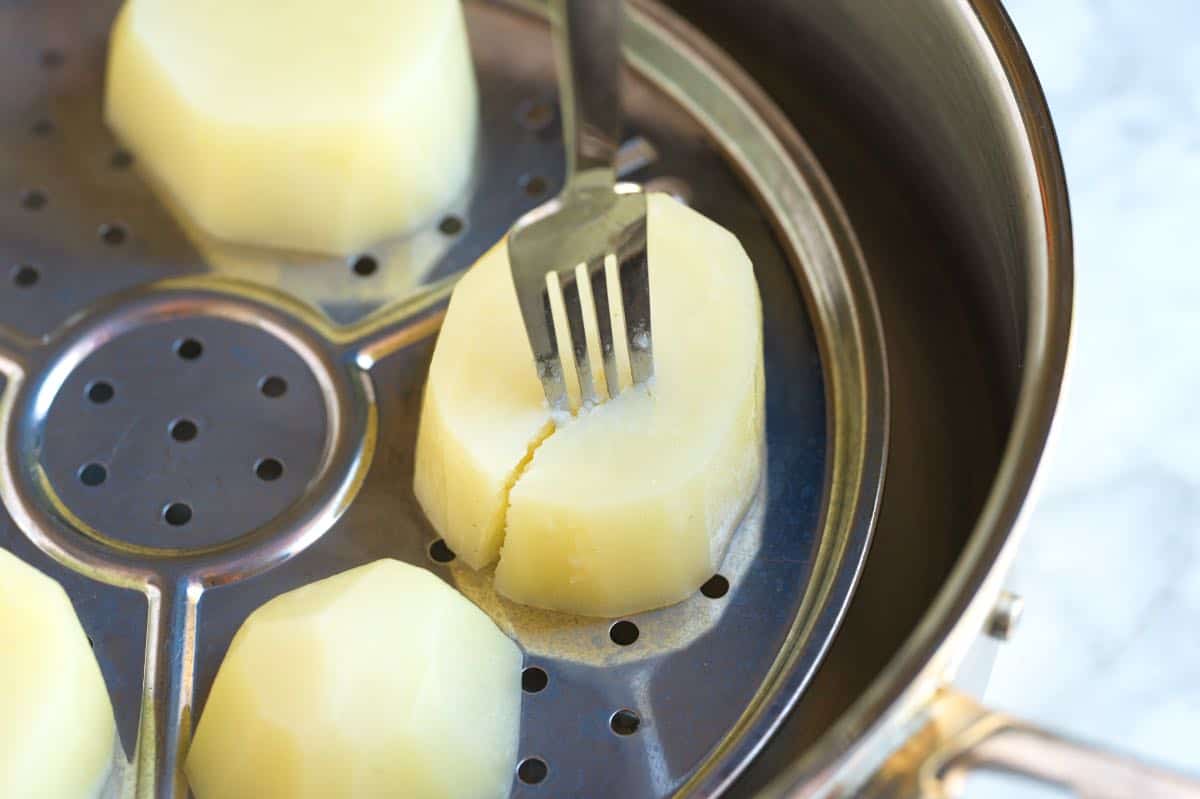 Steaming russet potatoes