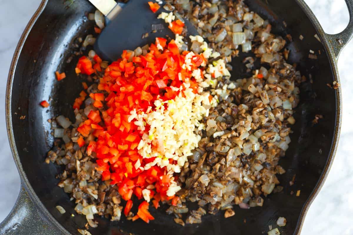 How to Make Meatloaf: Cooking mushrooms, onion, and garlic first.