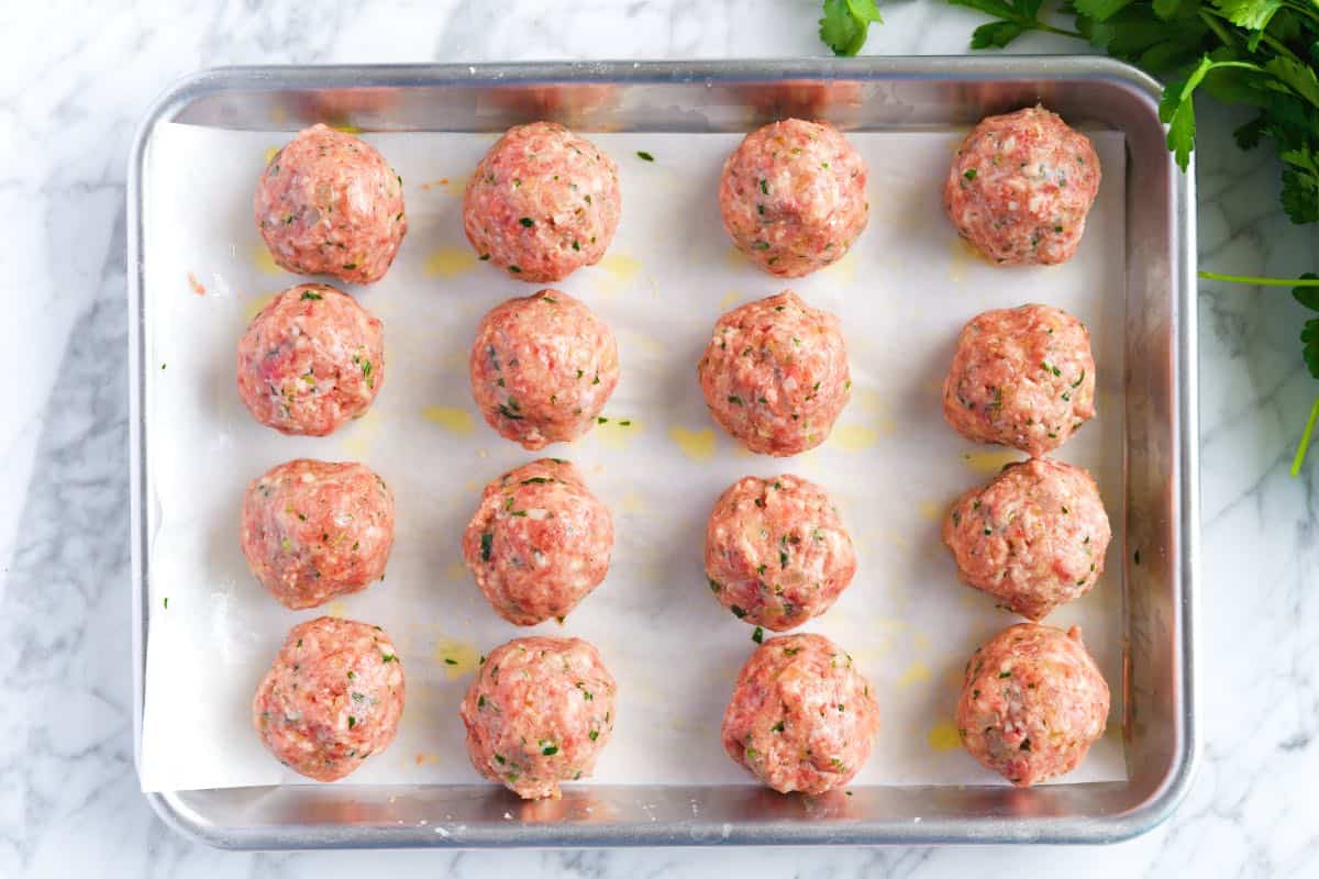 Meatballs ready to be baked in the oven for spaghetti and meatballs