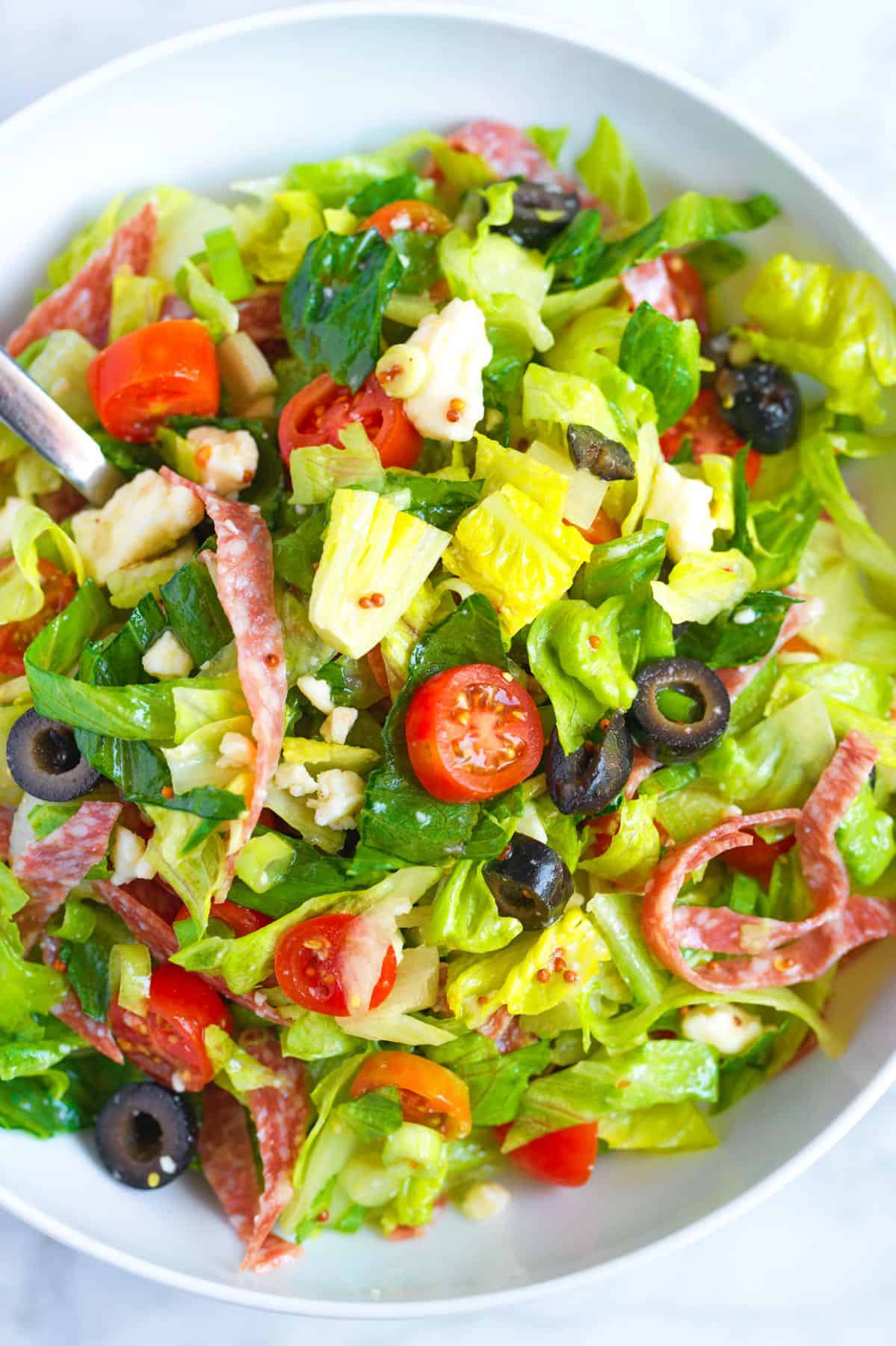 Easy Italian Chopped Salad ready to eat in a bowl.