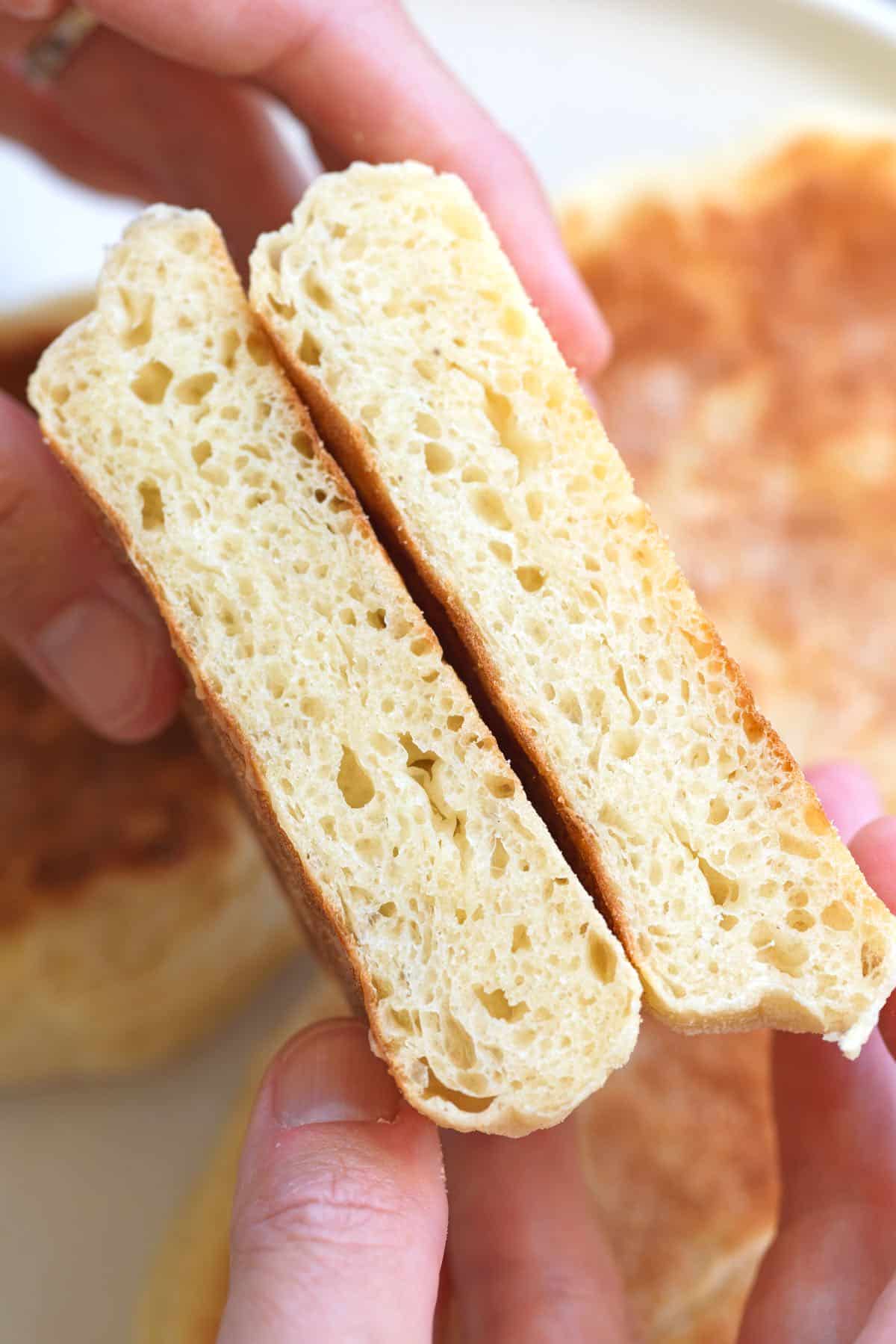 Showing cross-section of the muffins and how this English Muffins Recipe makes so many nooks and crannies