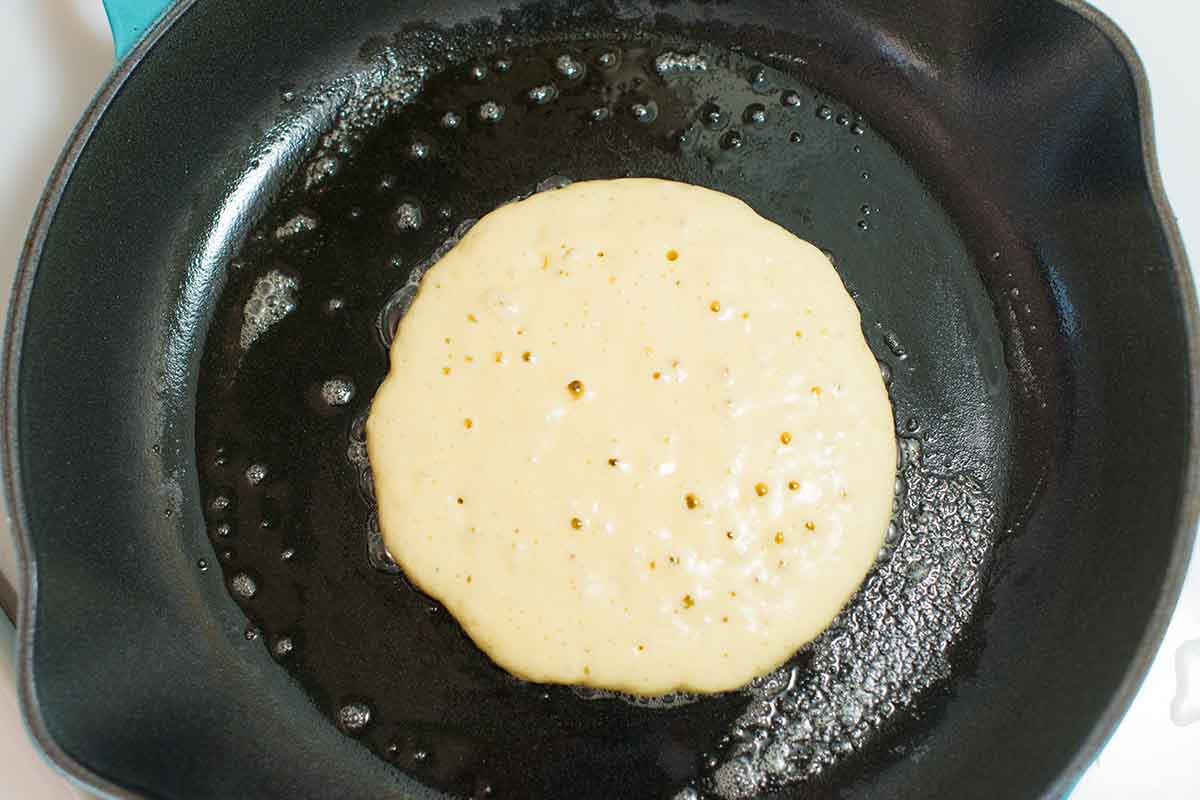 How to Make Pancakes -- a photo showing when to flip pancakes