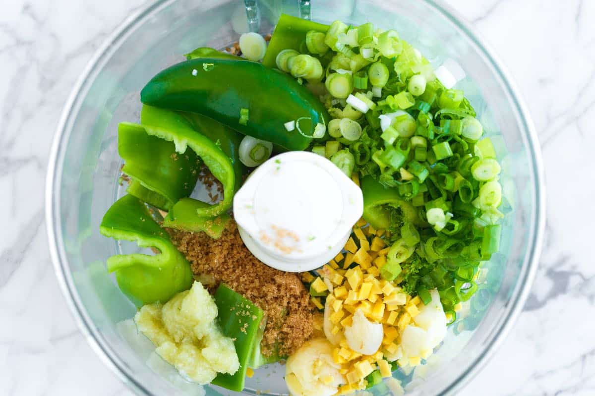 Making homemade Thai green curry paste in a food processor